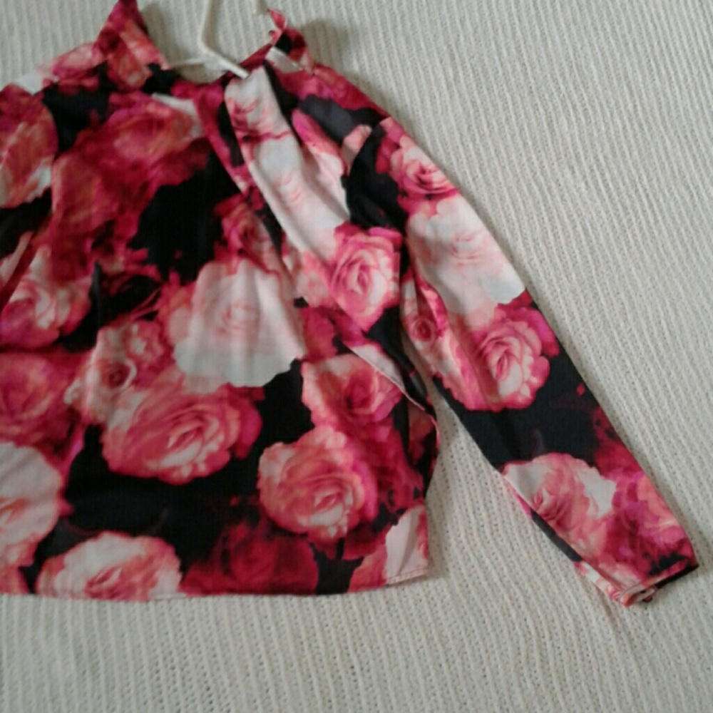 Pink and black floral long sleeve blouse.